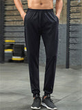 Men's Stretchy Elastic Waist Sporty Tapered Leg Pants with Pockets