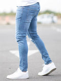 Stylish Well-fitting Ripped Light Blue Jeans for Men
