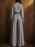 Women Collared Long Sleeve Wide Leg Belted Palazzo Jumpsuits