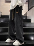 Men's Streetwear Faded Drawstring Elastic Waistband Wide Leg Denim Pants