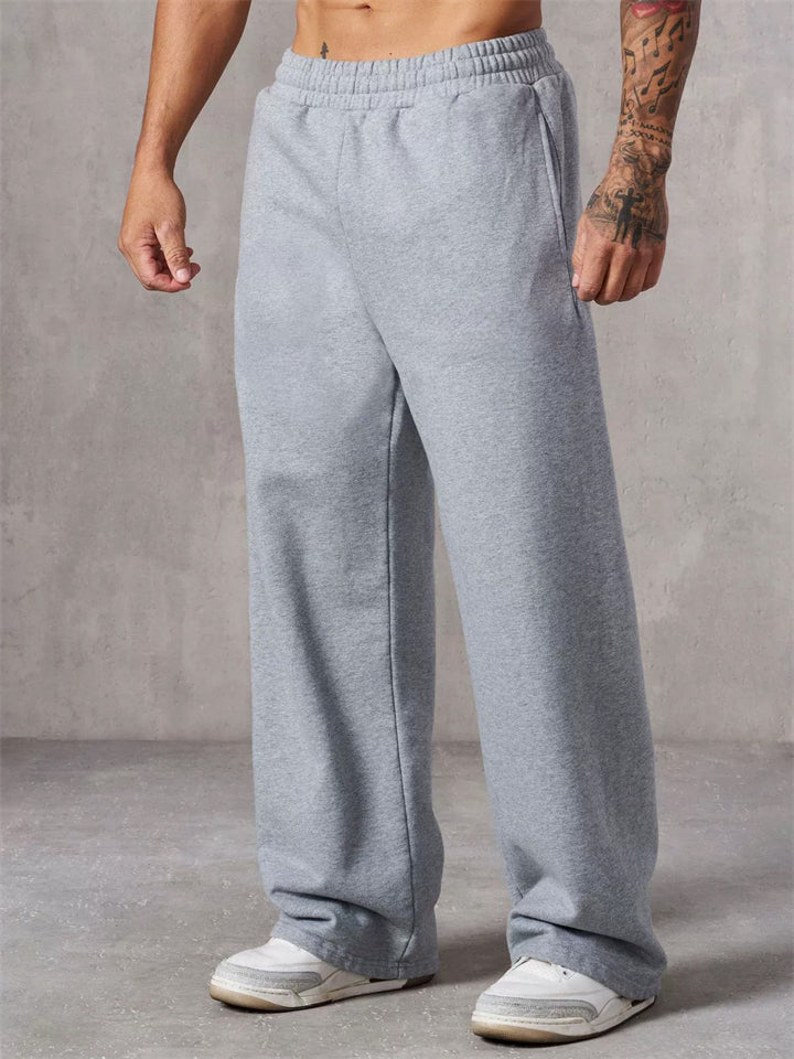 Men's Casual Solid Color Mid Waist Elastic Sporty Straight Wide Leg Trousers
