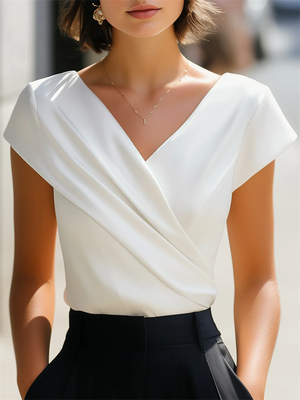 Female's Elegant White Sleeveless Back Zip V-Neck Pleated Blouse
