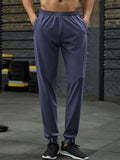 Men's Stretchy Elastic Waist Sporty Tapered Leg Pants with Pockets