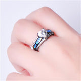 Glittering Blue Opal Elevated Heart Shimmering Stones Ring